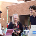 Tanish Kathir and Ian Bates present at Canyon Crest Academy’s club fair. The Financial Literacy Initiative began as an offshoot of the school’s Economics Club. Photo by William Pang