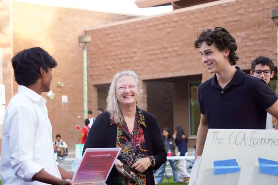 Tanish Kathir and Ian Bates present at Canyon Crest Academy’s club fair. The Financial Literacy Initiative began as an offshoot of the school’s Economics Club. Photo by William Pang