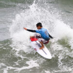 Encinitas native Kyan Yang rides a wave during the Virginia Beach Pro. Photo by Andrew Nichols