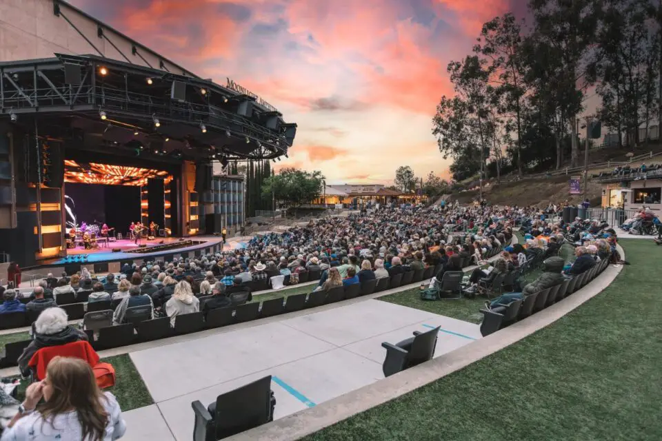Moonlight Amphitheatre in Vista filled with an audience during a performance at sunset.