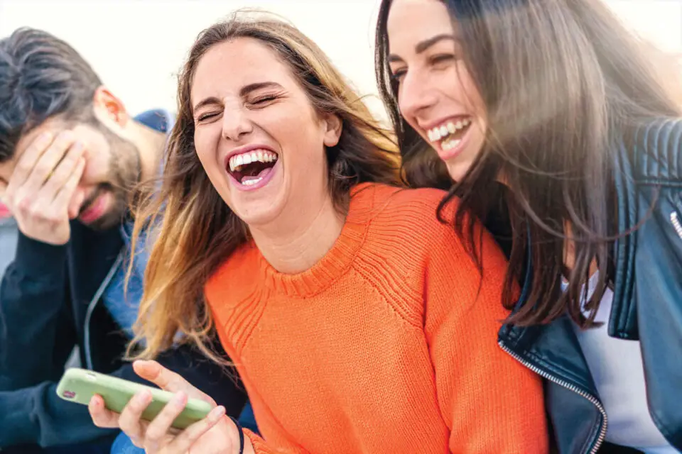 Laughing involves diaphragmatic breathing, giving you a bit of a workout. Stock photo
