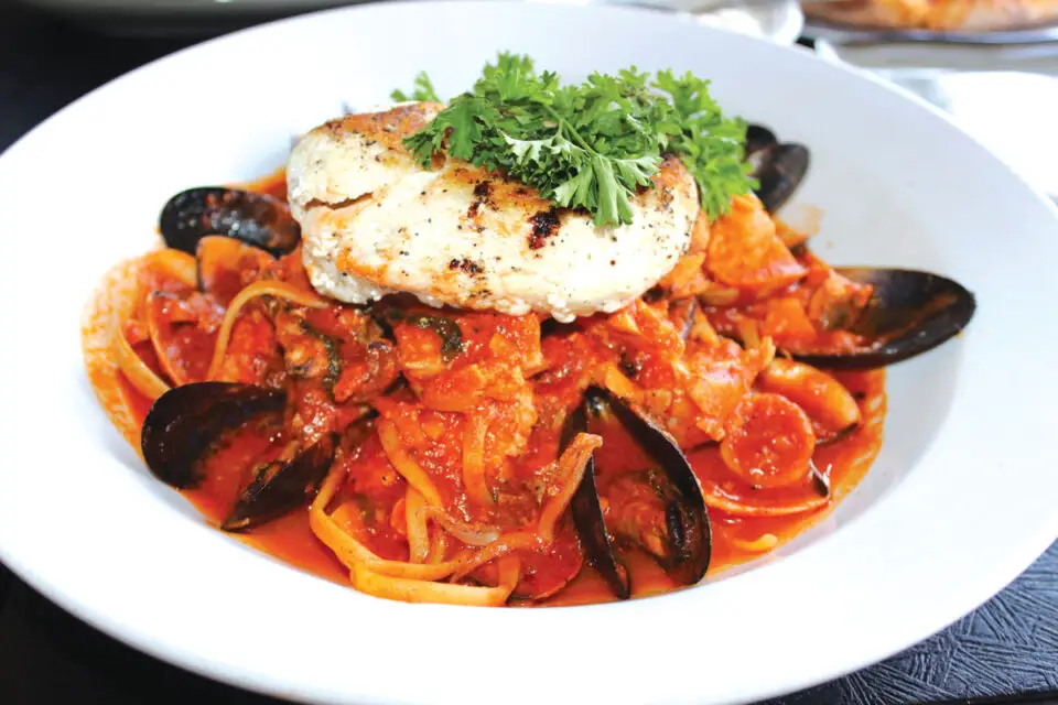 Francisco’s Seafood Brodetto is a hearty fish stew brimming with scallops, shrimp, clams, mussels and calamari in a garlic, wine and tomato broth. Photo by Rico Cassoni