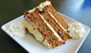 Towering 6-inch, triple-layer carrot cake with cream cheese frosting. Photo by Rico Cassoni