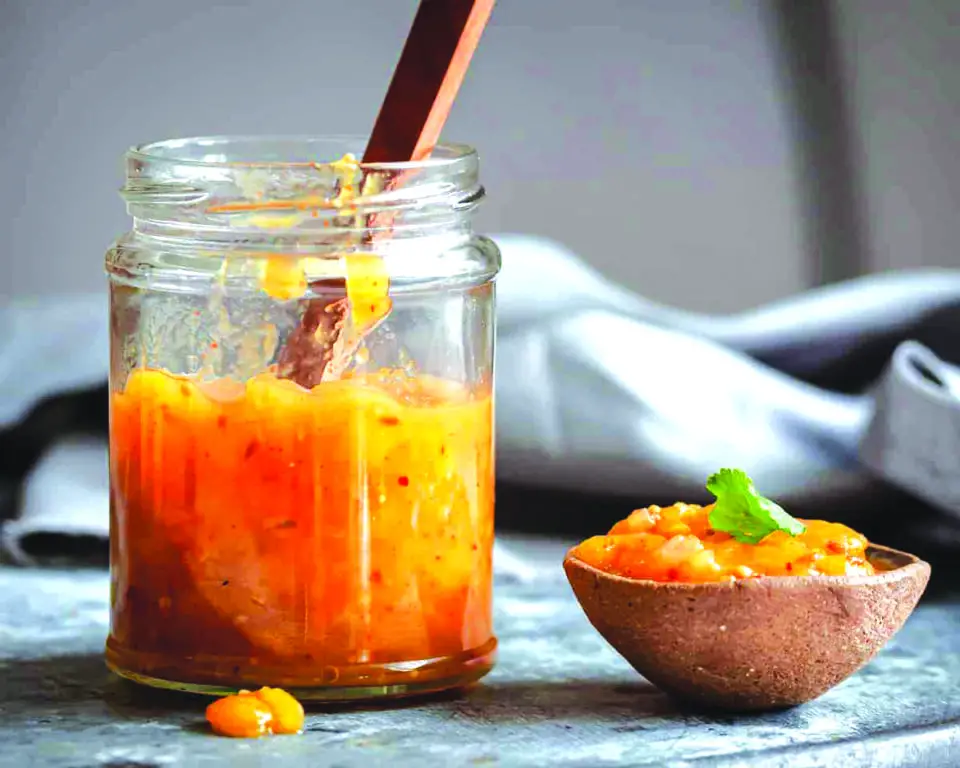 Mango chutney pairs well with sweet or savory dishes. Stock photo