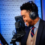 Patrick Howell, CEO of Global Market Intelligence & Media, records in a podcast studio. He is the author of "Getting Deals Done: The Memoirs of a Super Achiever in the Era of Apex Capitalism." Courtesy photo