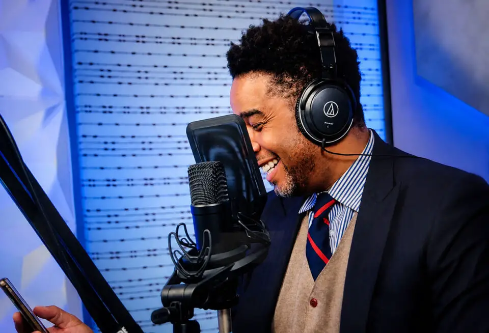 Patrick Howell, CEO of Global Market Intelligence & Media, records in a podcast studio. He is the author of "Getting Deals Done: The Memoirs of a Super Achiever in the Era of Apex Capitalism." Courtesy photo