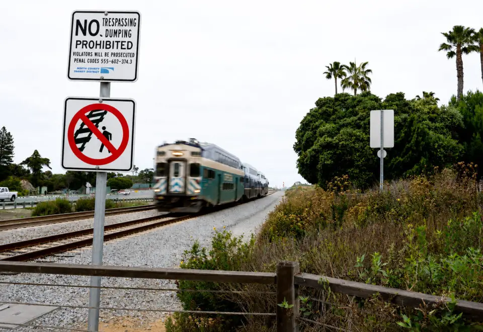 A train passes through the Chesterfield Drive crossing in Encinitas. The city is set to receive up to $33.6 million in federal funding for railroad crossing safety improvements along a six-mile stretch of the LOSSAN Rail Corridor. File photo/Michelle Slentz