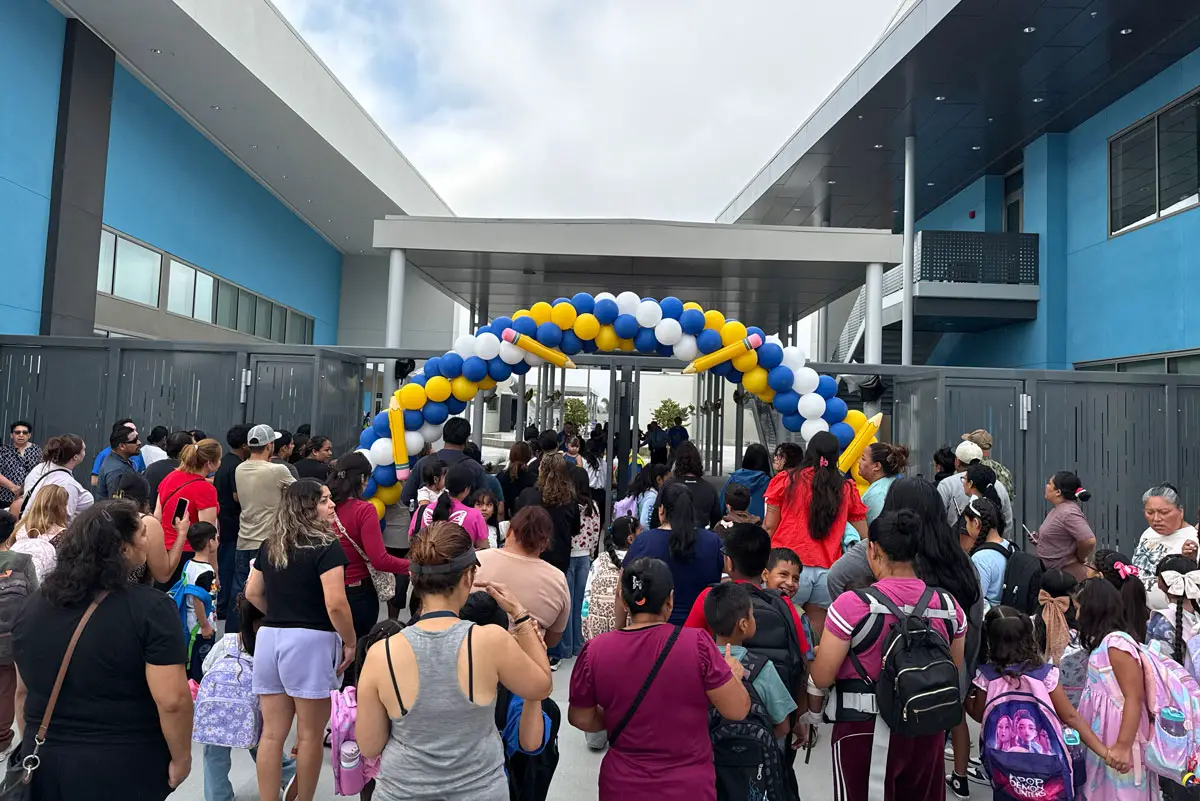 Students and their families pass under a balloon arch on the first day of school at the newly rebuilt Bobier Elementary. Courtesy photo/VUSD