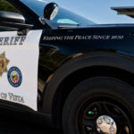 A San Diego County Sheriff's Office patrol SUV with the Vista Sheriff's Station. Courtesy photo/Sheriff's Office