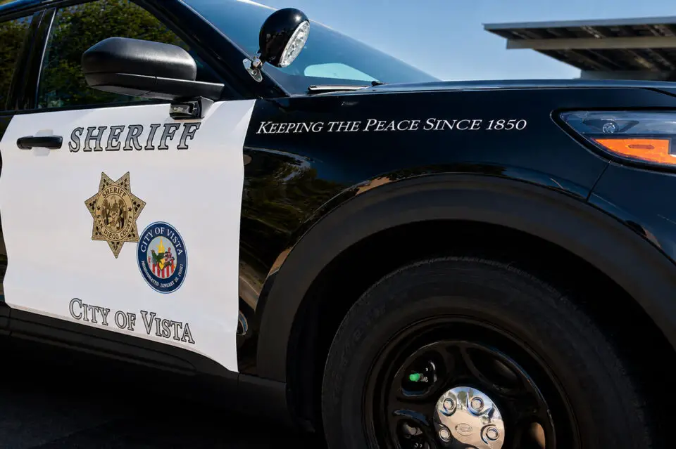 A San Diego County Sheriff's Office patrol SUV with the Vista Sheriff's Station. Courtesy photo/Sheriff's Office
