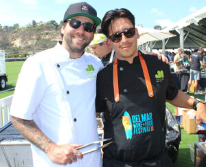Juniper and Ivy executive chef Alex Penkin, left, and sous chef Ruben Comparan served melt-in-your-mouth beef kabobs at last year’s festival. Photo by Rico Cassoni