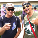 Three-time World Surfing Champion Tom Curren, left, and longtime friend Ken Eichenberg attend the 33rd annual Legends of Science & Surfing event at Scripps Pier on Saturday, Aug. 15. Photo by Chris Ahrens