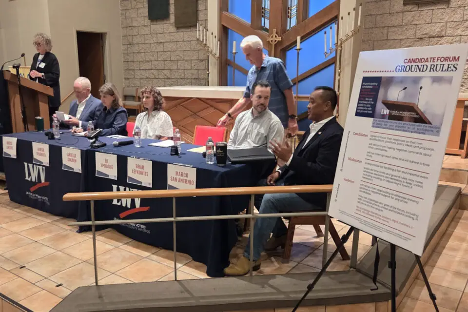 Candidates for Encinitas mayor and City Council chat before a forum hosted by the League of Women Voters on Sept. 17 at St. Andrew Episcopal Church. Photo by Jim Trageser