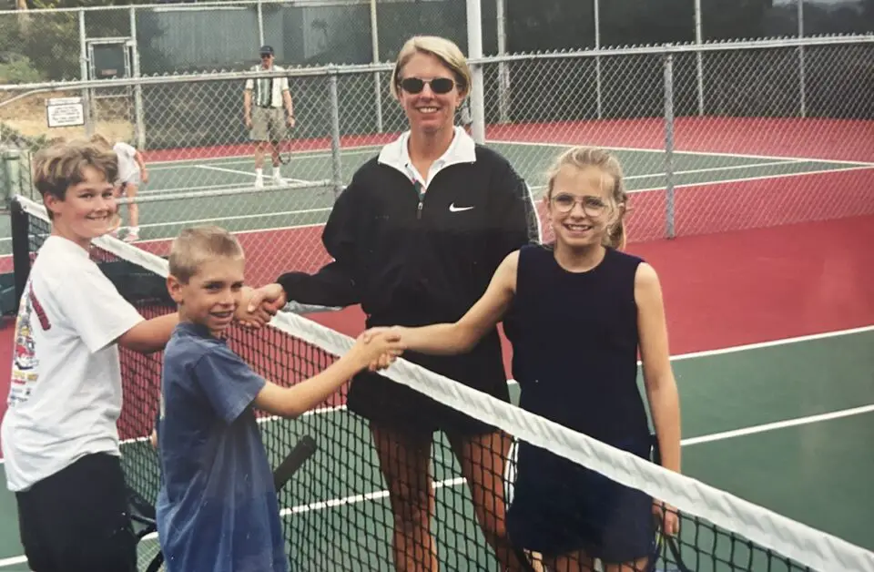 Tennis players shake hands at San Dieguito Tennis Club in 1998. Courtesy photo/San Dieguito Tennis Club