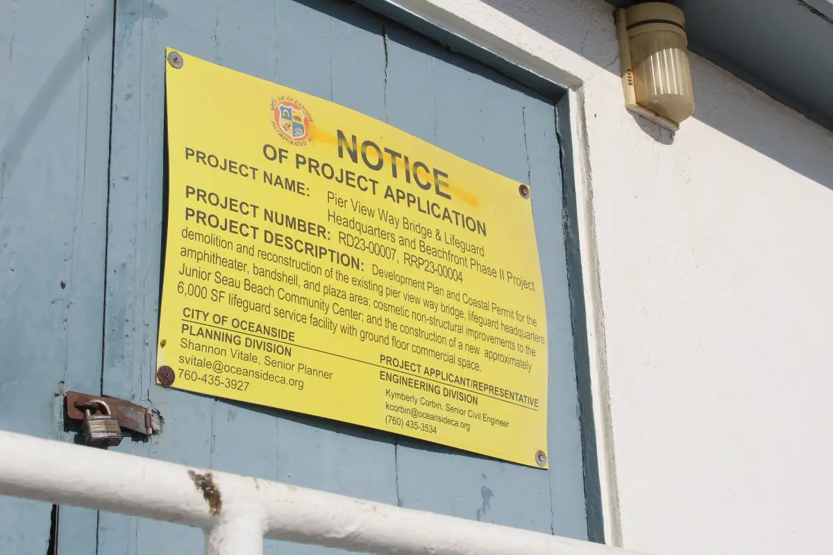 A sign in Oceanside provides public notice of the pier bridge and lifeguard headquarters reconstruction project. Photo by Samantha Nelson
