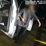 A screenshot depicting the juvenile male with a ghost gun in his hand attempting to flee from Carlsbad Police officers. Screenshot/CPD