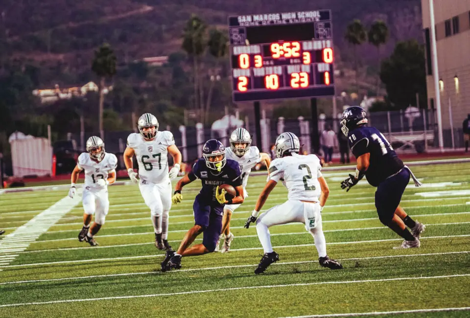 Ezekiel McIntyre’s big night included 10 catches for 148 yards and three trips to the end zone. San Marcos defeated visiting Poway, 28-14. Photo by Julian Liner