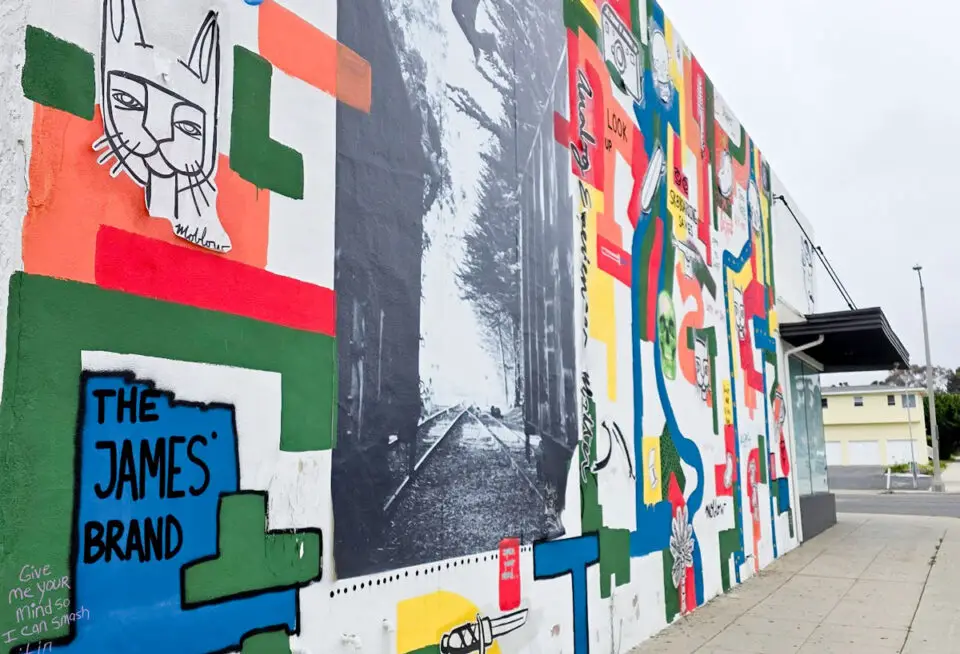 A mural on the side of Knuckleheads Barber Shop in Oceanside. Photo by Patrick Howell