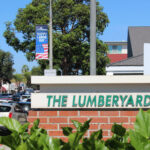 A sign at the entrance to The Lumberyard shopping center in downtown Encinitas. Photo by Jordan P. Ingram
