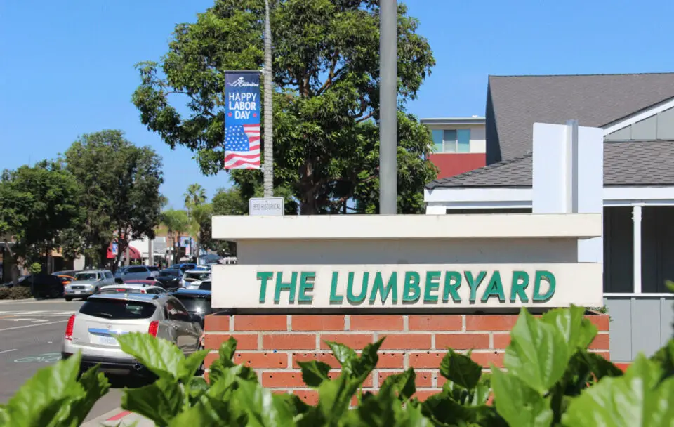 A sign at the entrance to The Lumberyard shopping center in downtown Encinitas. Photo by Jordan P. Ingram