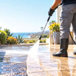 What looks worn out may simply need a deep cleaning. Professional pressure washing can transform patios, walkways and other outdoor surfaces in surprisingly dramatic ways. Photo illustration by ChatGPT