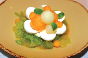 Sweet summer melon pavlova with Piel de Sapo melon, melon granita, whipped citrus yuzu, sea salt and olive oil. Photo by Rico Cassoni