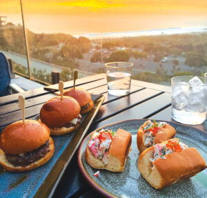 Lobster Rolls and Wagyu Sliders with a side of sunset views. Photo by David Boylan
