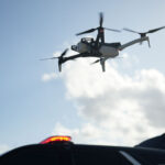 A Skydio drone flies over a patrol vehicle. Courtesy photo/Skydio Media Resources