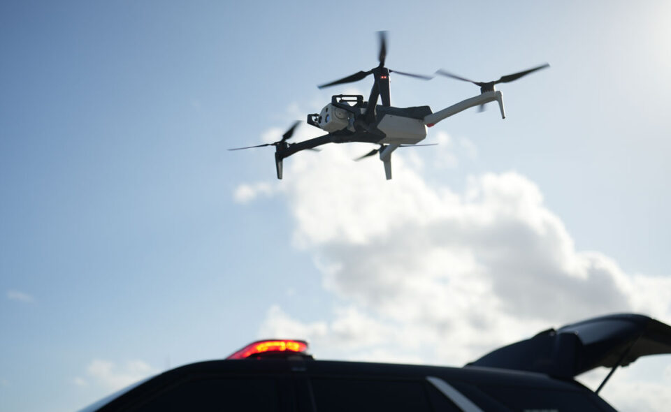 A Skydio drone flies over a patrol vehicle. Courtesy photo/Skydio Media Resources