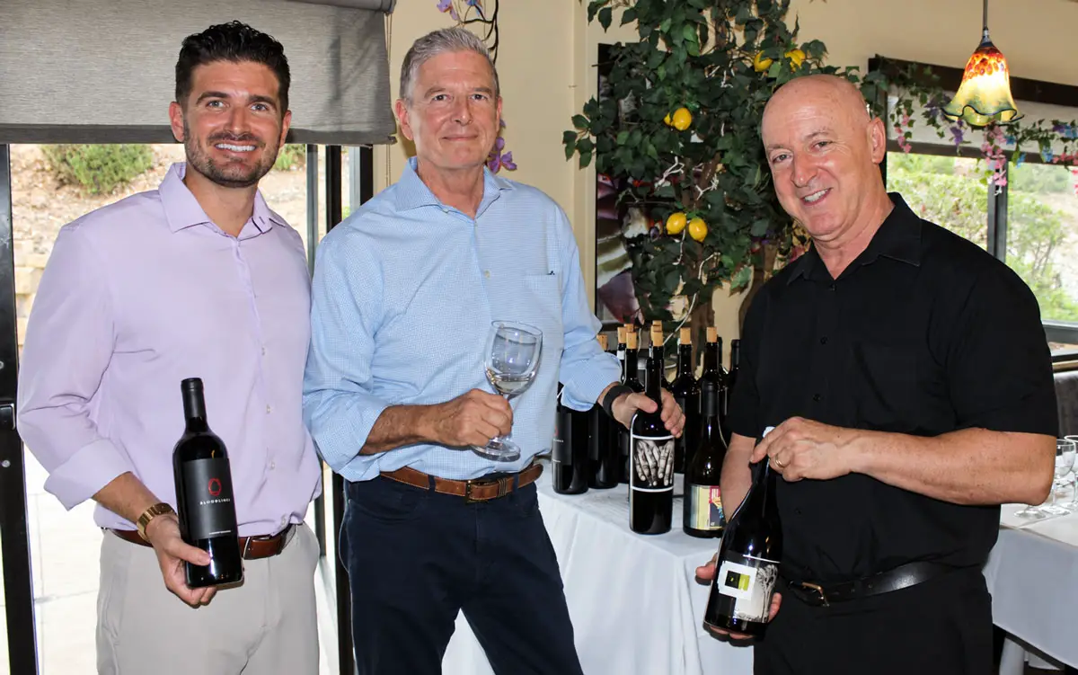 Tyler Williams, E. & J. Gallo Rep (left), Scott Blackburn, BreakThru Beverage Group Sales Rep, and Victor Magalhaes, Proprietor, Vittorio’s Italian Trattoria. Photo by Rico Cassoni