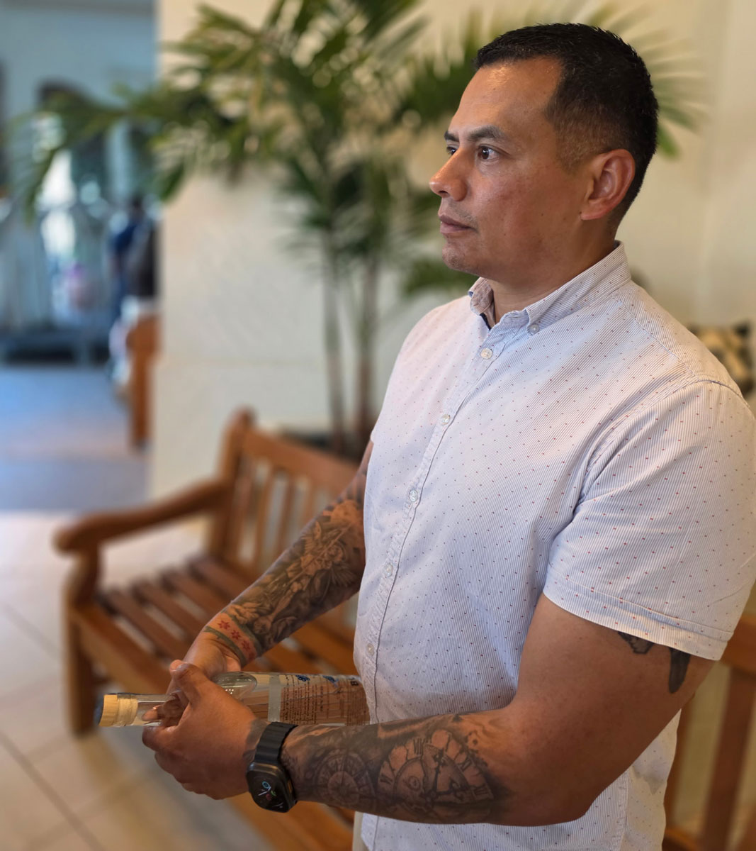 Saul Ocampo holds a bottle of Burero Mezcal, a brand rooted in the traditions and cultural heritage of Guerrero, Mexico. The entrepreneur credits character, relationships and family legacy as foundations of his business. Photo by Patrick Howell