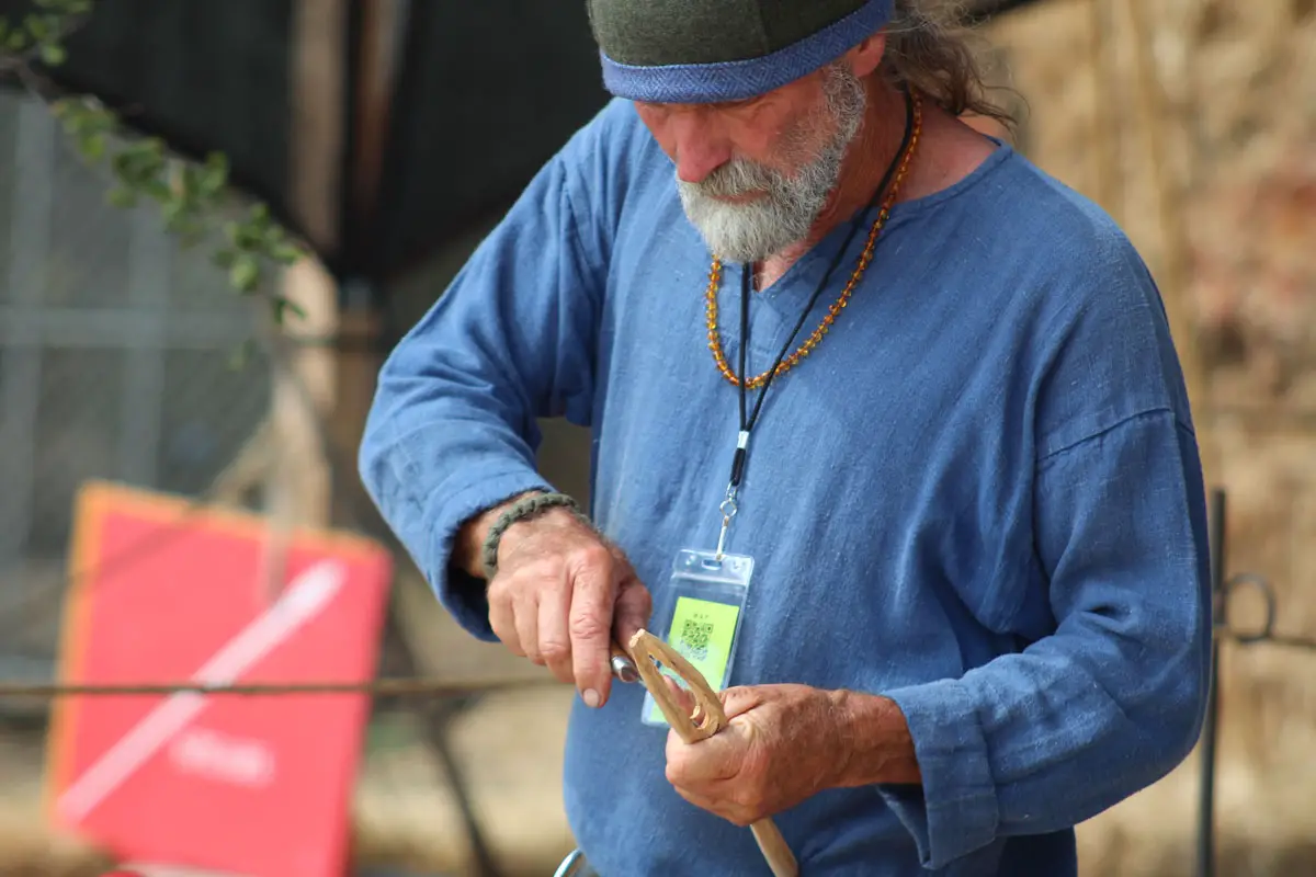 A craftsman works with wood.