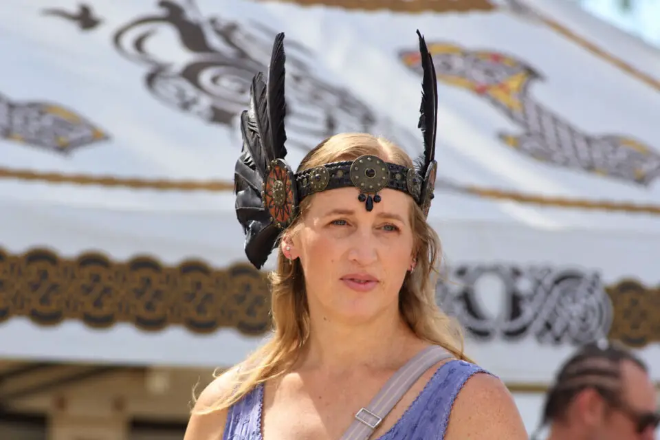 A woman dressed as a valkyrie walks through the Vista Viking Festival. In Norse mythology, valkyries ride into battle to determine who survives, and guides the slain to the afterlife. Photo by Samantha Nelson