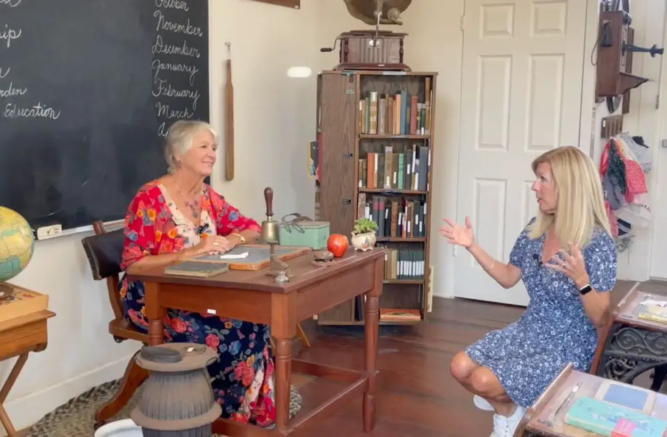 Encinitas Historical Society president Carolyn Cope, left, and Encinitas Chamber CEO Carol Knight at the 1883 Schoolhouse, the oldest standing building in Encinitas. Courtesy photo