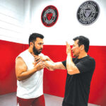 United Defense Tactical in San Marcos provides professionally led, reality-based training designed to help people become better prepared for real-world threats. Above, instructor John Duza, right, works with Mario. Courtesy photo