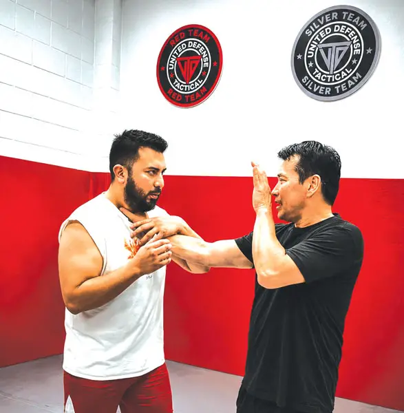 United Defense Tactical in San Marcos provides professionally led, reality-based training designed to help people become better prepared for real-world threats. Above, instructor John Duza, right, works with Mario. Courtesy photo