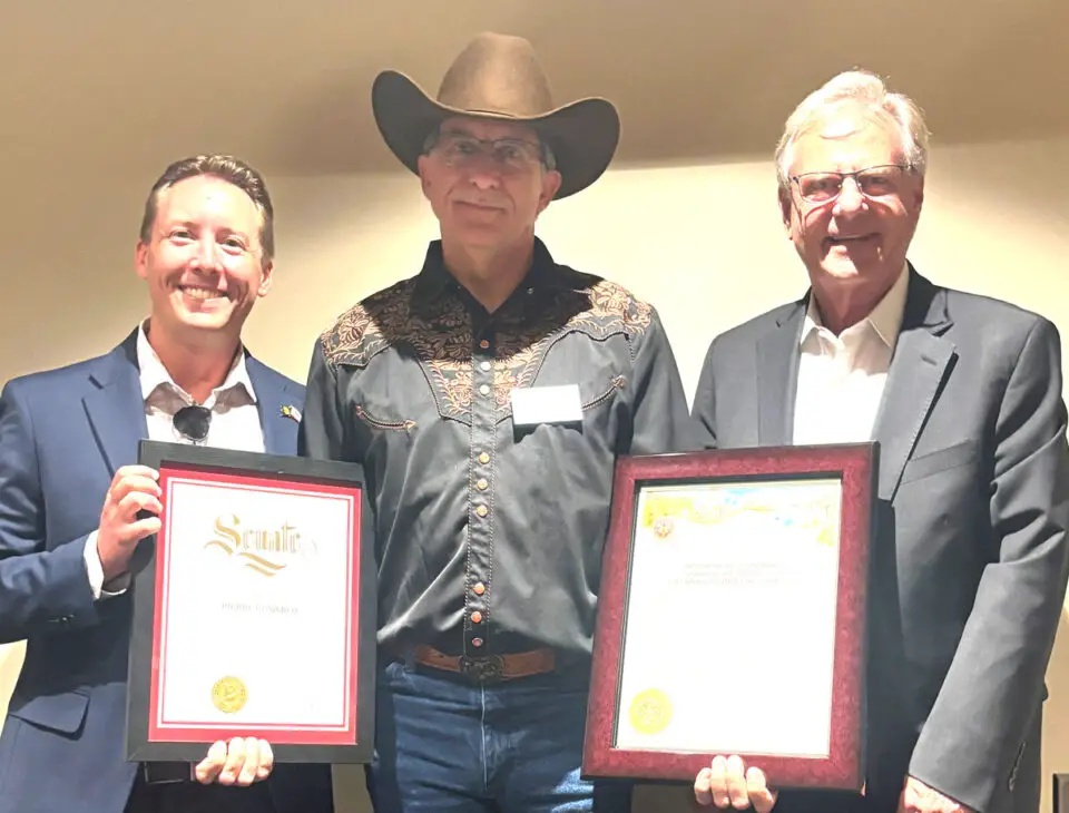 Pierre Domercq, center, was honored Sept. 16 by county Supervisor Jim Desmond, right, and the office of state Sen. Brian Jones. Courtesy photo