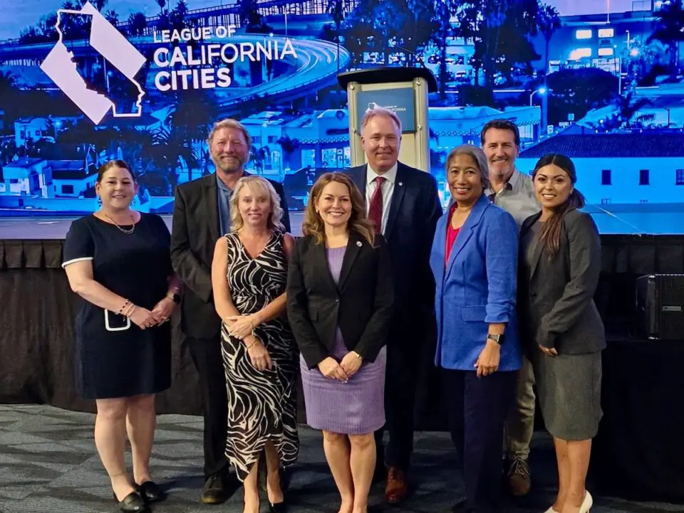 Council Member Teresa Acosta, center in purple dress, at League of California Cities annual convention. Photo courtesy of City of Carlsbad
