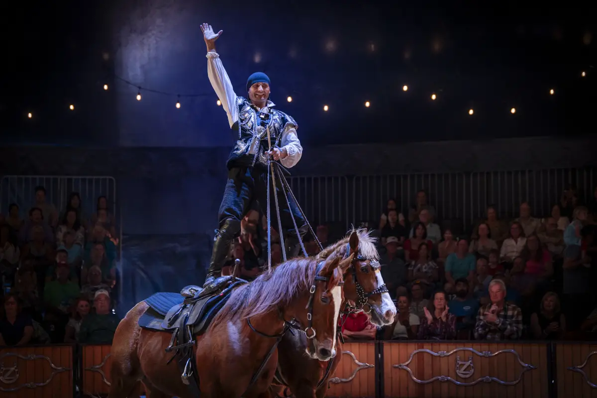 A performer with Cirque Ma'Ceo rides during a recent show. Courtesy photo / Cirque Ma'Ceo
