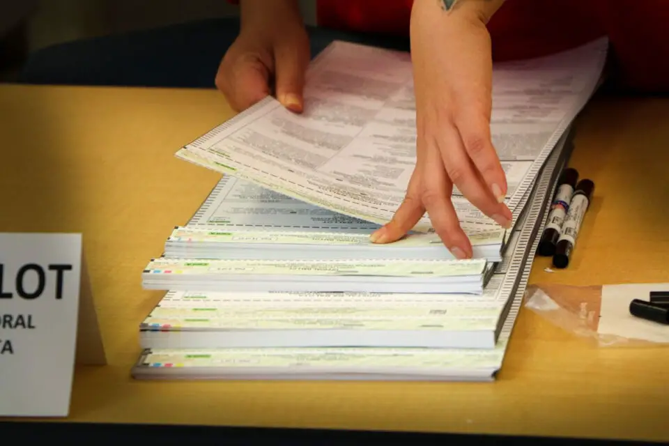 A worker handles ballots at the San Diego County Registrar of Voters. Courtesy photo/County of San Diego