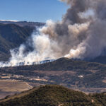 A massive plume of smoke rises from the Henderson Fire Oct. 15 at Camp Pendleton. Courtesy photo/OCFA