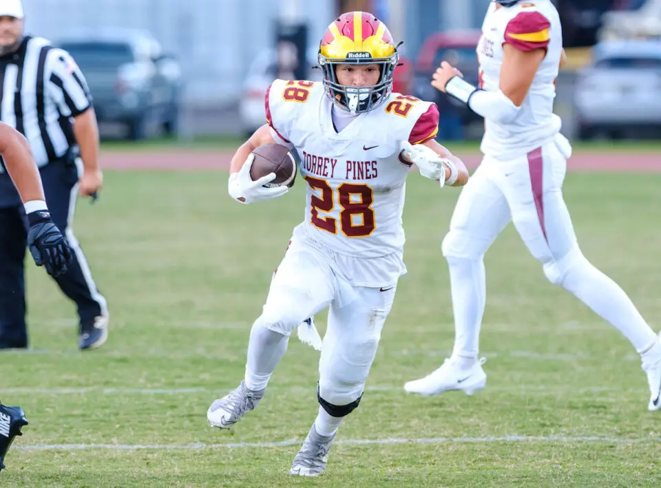 Torrey Pines running back Jacob Kreiss rushed for two touchdowns in the Falcons’ 22-7 victory over Poway on Friday night. Photo by Brian Bautista