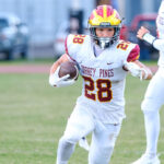 Torrey Pines running back Jacob Kreiss rushed for two touchdowns in the Falcons’ 22-7 victory over Poway on Friday night. Photo by Brian Bautista
