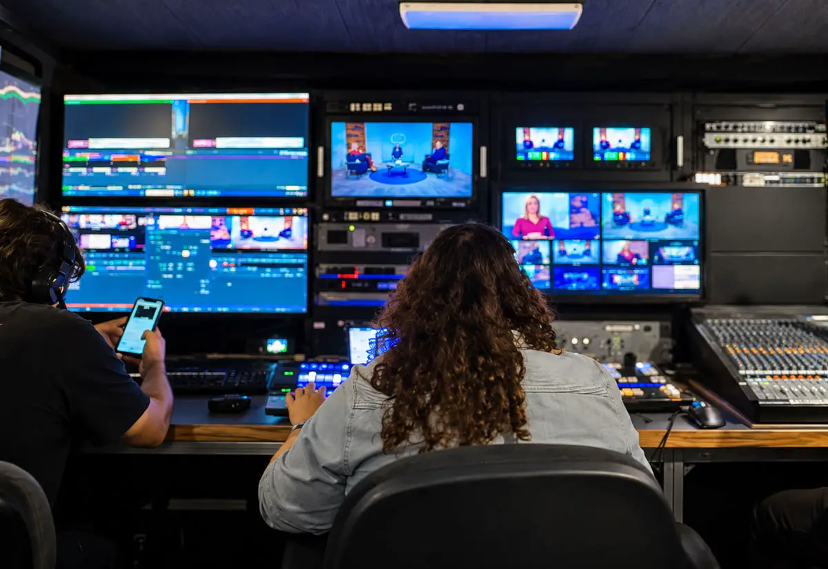 KOCT staff members work inside the station’s television production control room in Oceanside. Courtesy photo/KOCT