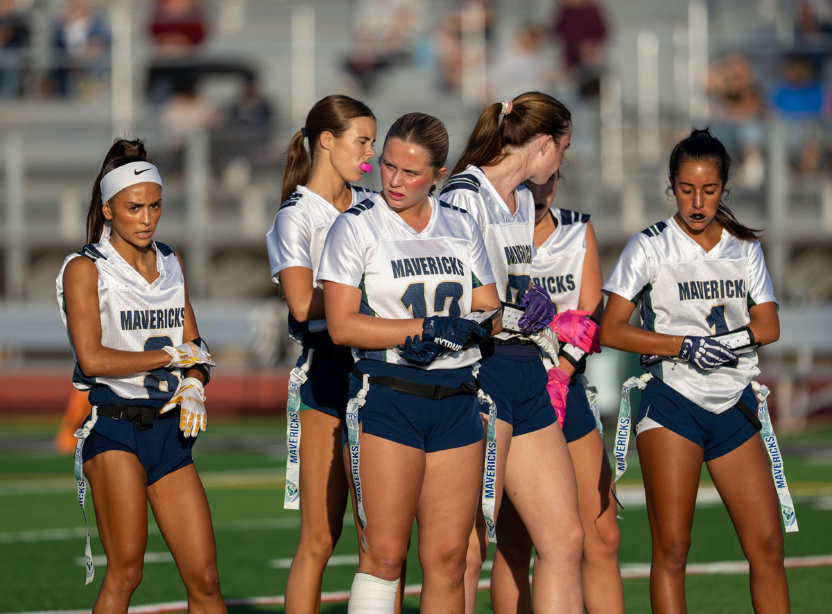 La Costa Canyon flag football players during a Sept. 16 game against crosstown rival Carlsbad High. The Mavericks’ senior captains are pursuing an Avocado League title in their fourth season with the program they helped build. Photo by Craig Maloof