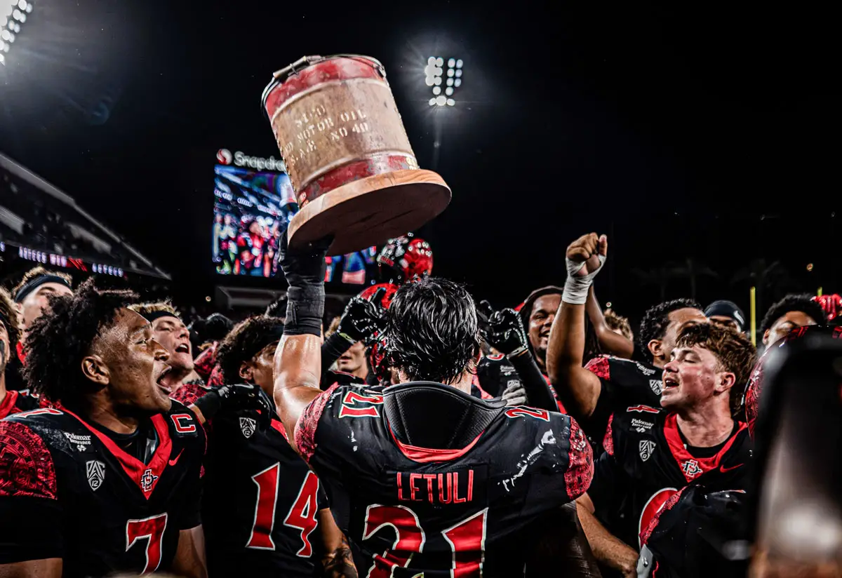 Lucky Sutton helped San Diego State retain the Old Oil Can trophy with a 119-yard rushing performance against Fresno State on Saturday. His career-long 67-yard run to open the fourth quarter helped set up a touchdown in the Aztecs’ 26-23 win. Photo by Isaac Angel