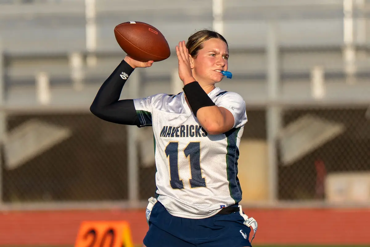 La Costa Canyon sophomore quarterback Lily Lejeune slings the ball during a Sept. 16 game against Carlsbad High School. Photo by Craig Maloof