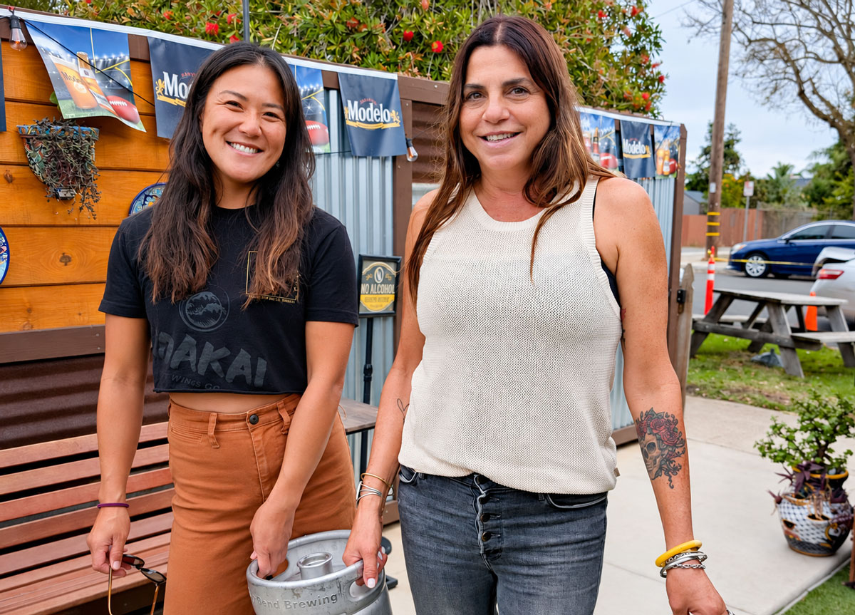 Koakai Brewing’s Tamami Yoshida, left, delivers a fresh keg of Local Knowledge IPA to Sacorro Jauregui at Lola's 7Up Market & Deli in downtown Carlsbad. Photo by Jeff Spanier