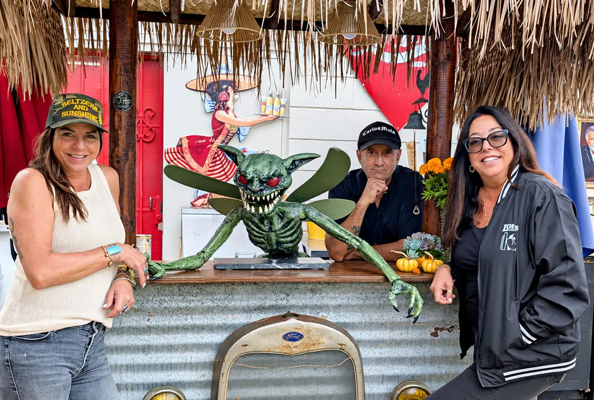 Sacorro Jauregui (left), Henry Trejo (center), and Dee Dee Trejo run Lola's together. Photo by Jeff Spanier