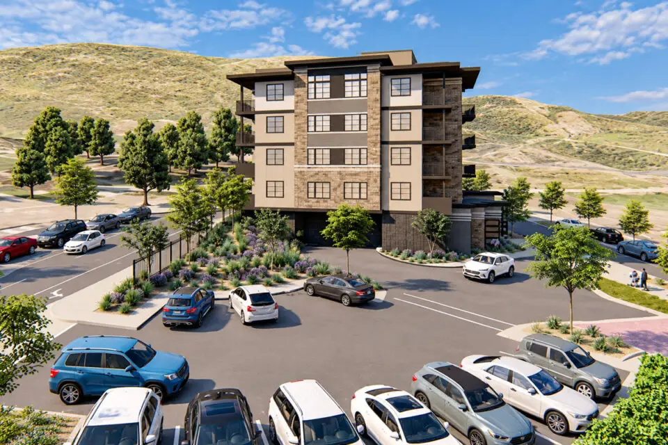 A west-facing rendering shows the proposed condominium project on a half-acre parcel where San Elijo Road splits into two one-way roadways. Rendering courtesy of Ambient Communities